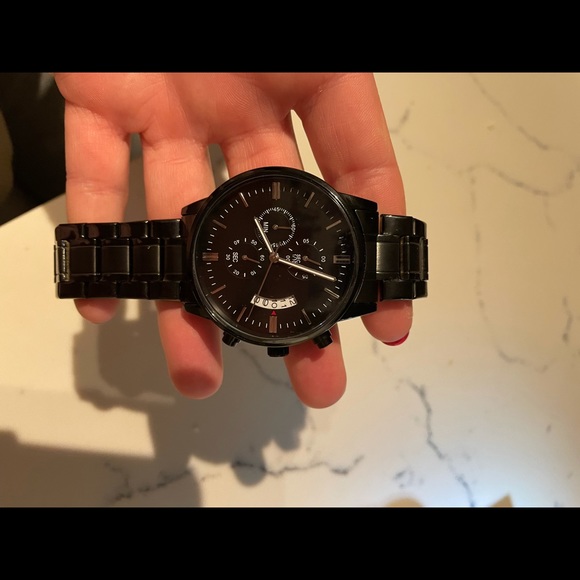 Fancy scratch proof and water proof watch brand new. Has engraving.
